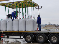 TRANSSHIPMENT OF 5.000 TONNES OF FERTILIZER